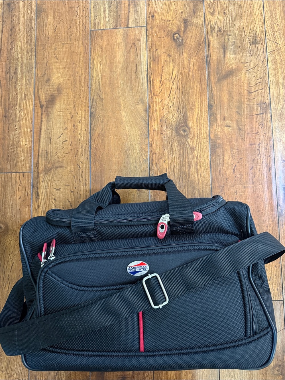 American Tourister Black Travel Duffel with Red Accents